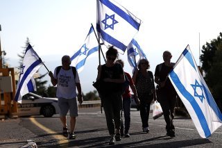 Des mois de manifestations, dont certaines en soutien au gouvernement, ont fait craindre une aggravation des fractures au sein de la société israélienne (image symbolique).